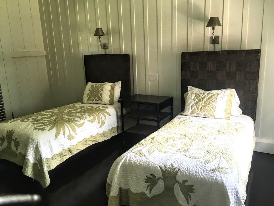 The additional rooms have two twin beds to accommodate guests.
